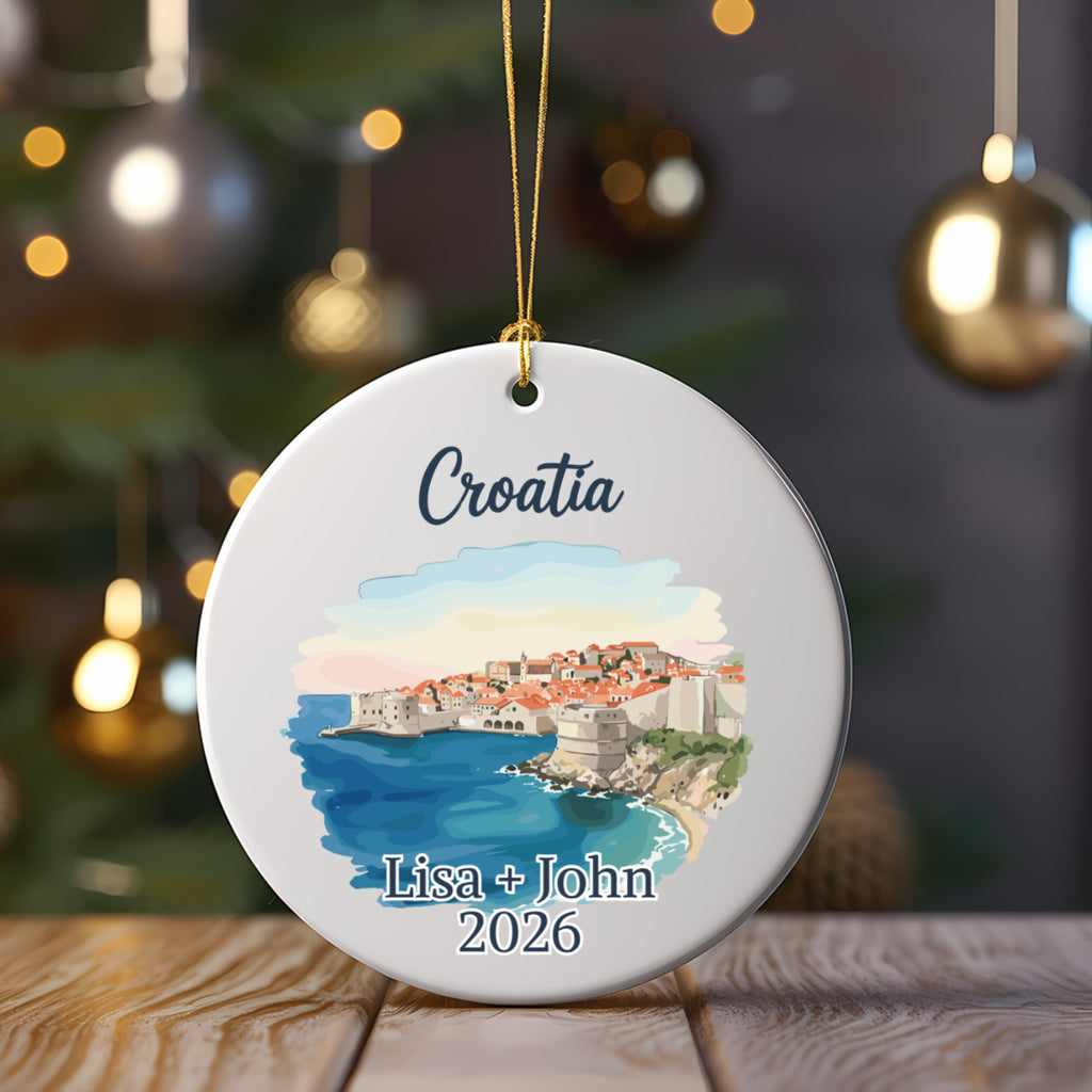 Round ornament with watercolor of Dubrovnik, Croatia and custom names and year.