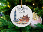 Ceramic ornament showing Taipei 101 in Taiwan with a market scene below.