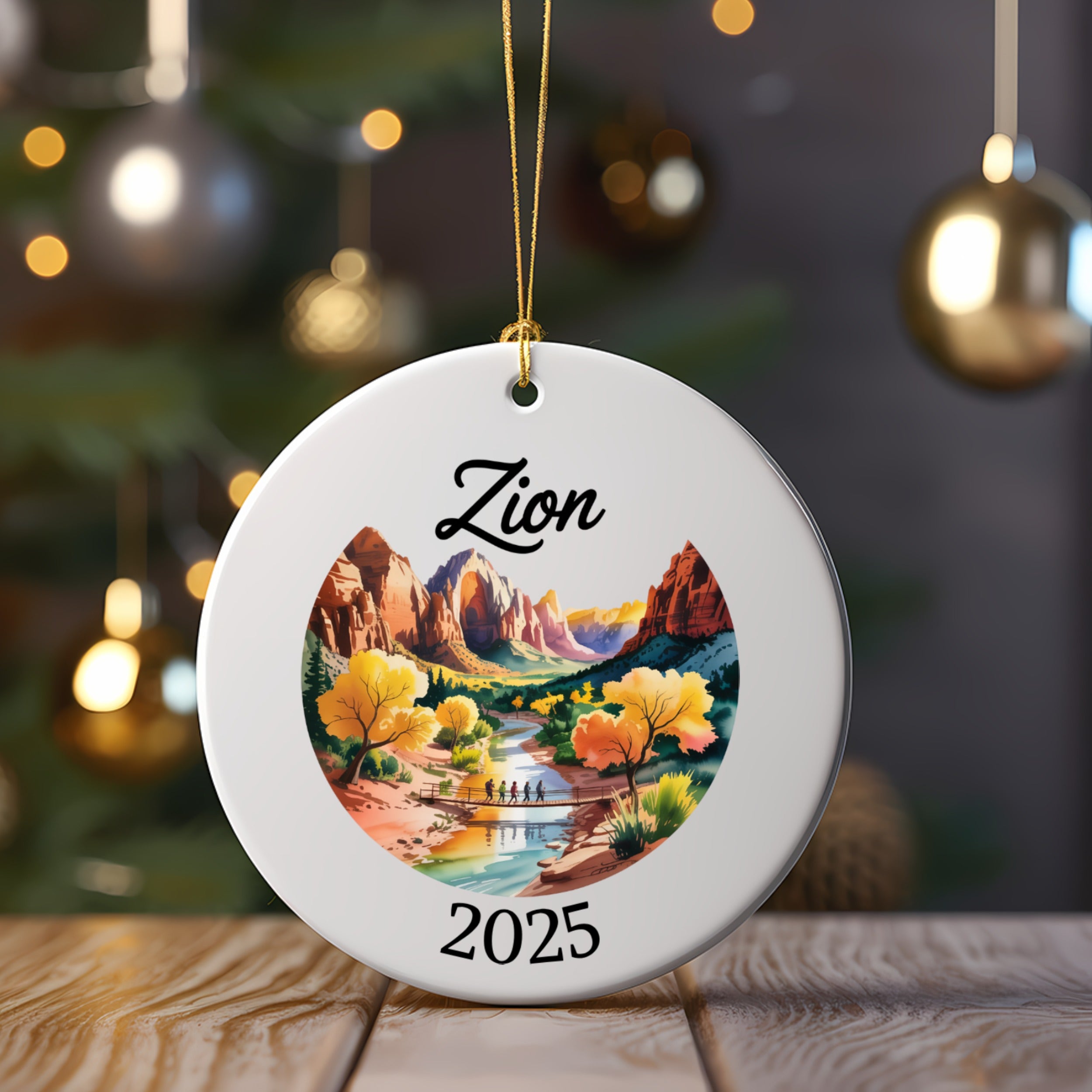 White circular ornament with Zion National Park scene and "2025" text.