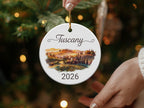 Tuscany 2026 ceramic ornament with rolling hills and cypress trees.