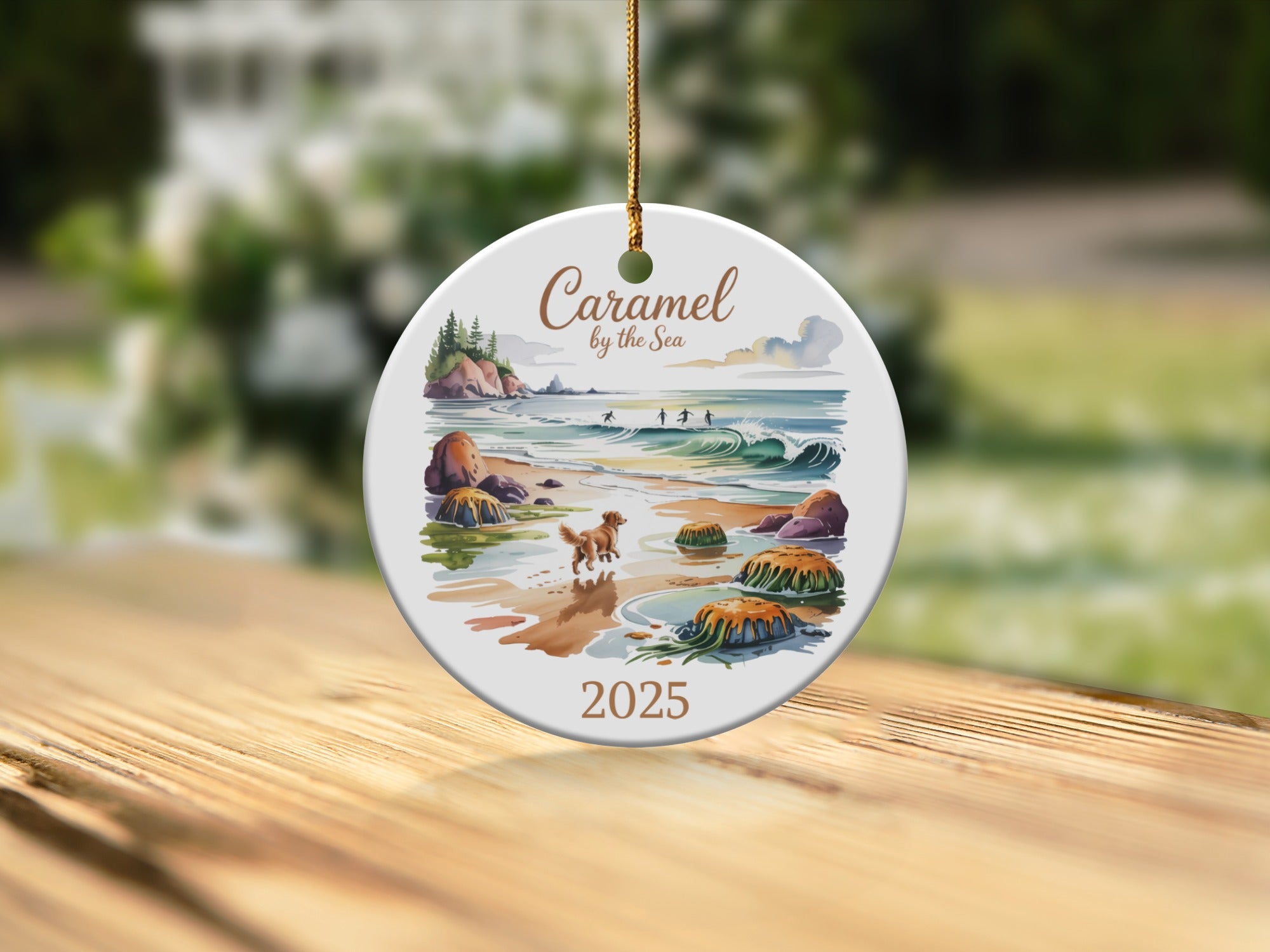 Caramel by the Sea ceramic ornament with beach scene and text "2025".