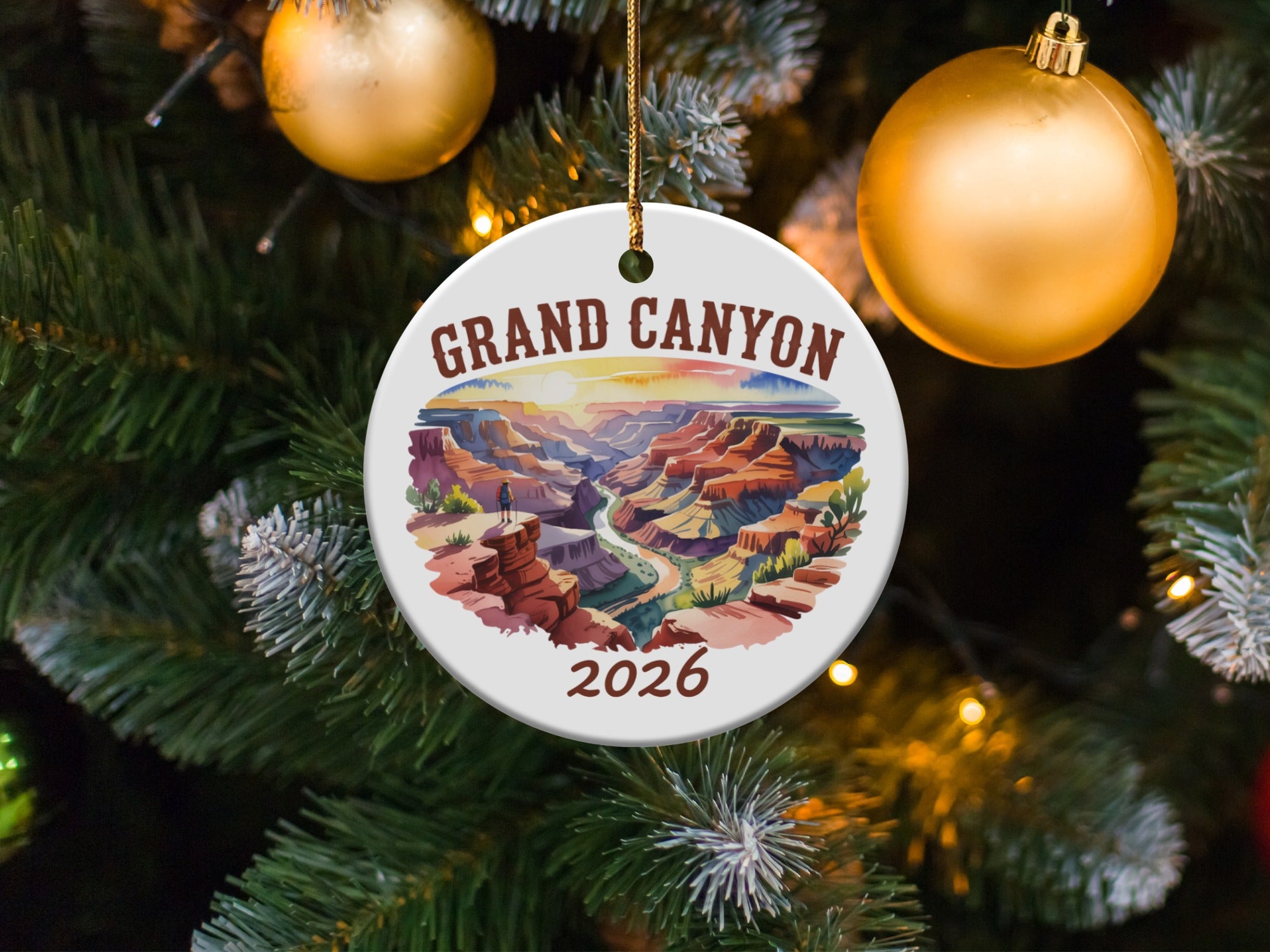 Grand Canyon ceramic ornament with sunset view and "2026" text.