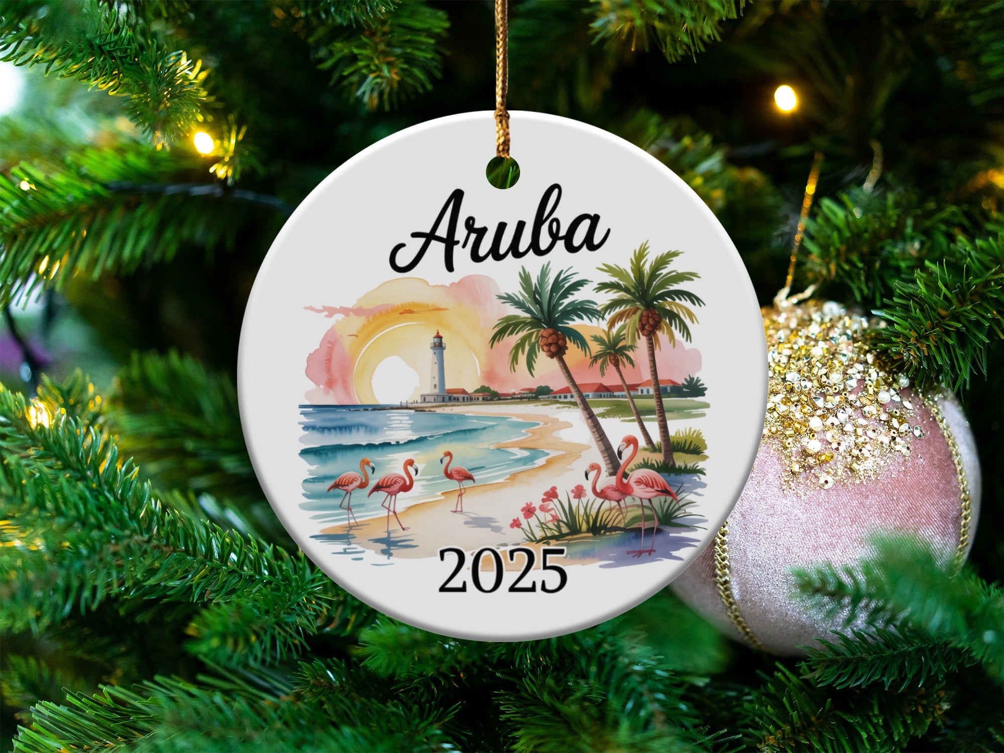 Aruba 2025 Christmas ornament with flamingos on a beach and lighthouse.