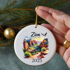 Round ornament with Zion National Park watercolor scene and 2025 date.