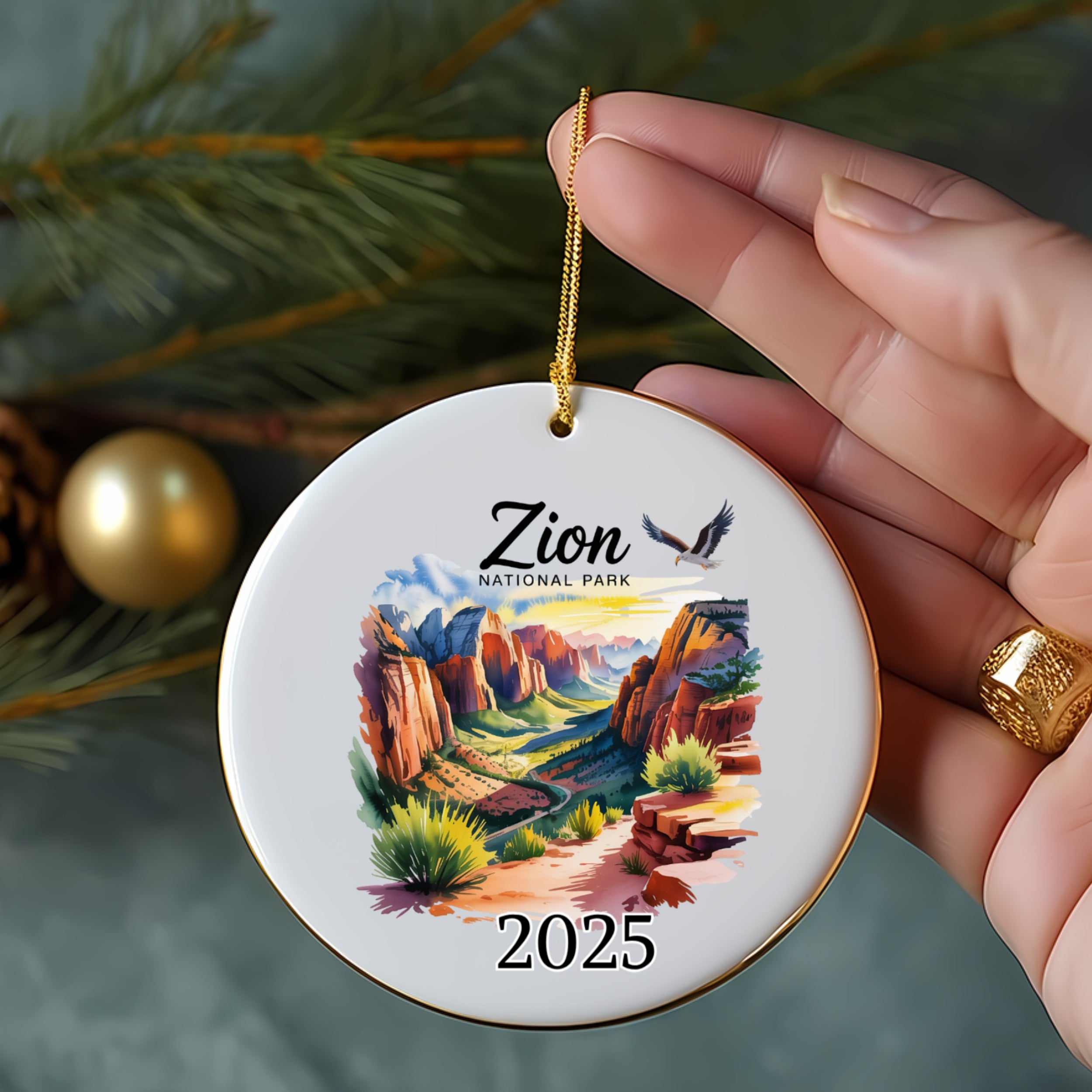 Round ornament with Zion National Park watercolor scene and 2025 date.