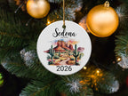 Sedona 2026 ornament with desert landscape and cacti.