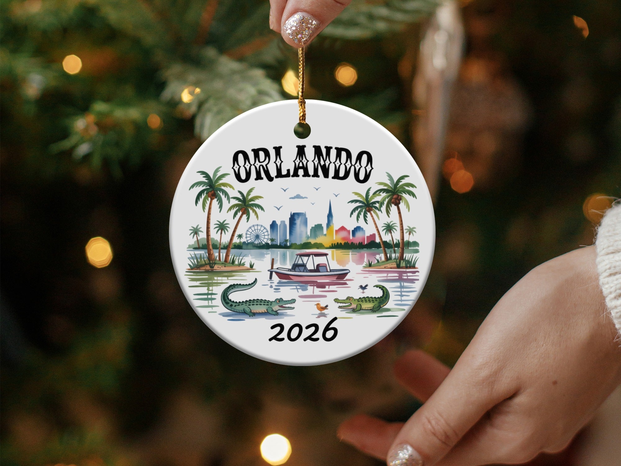Round ornament with "Orlando" text and alligator, palm trees, and skyline graphic.