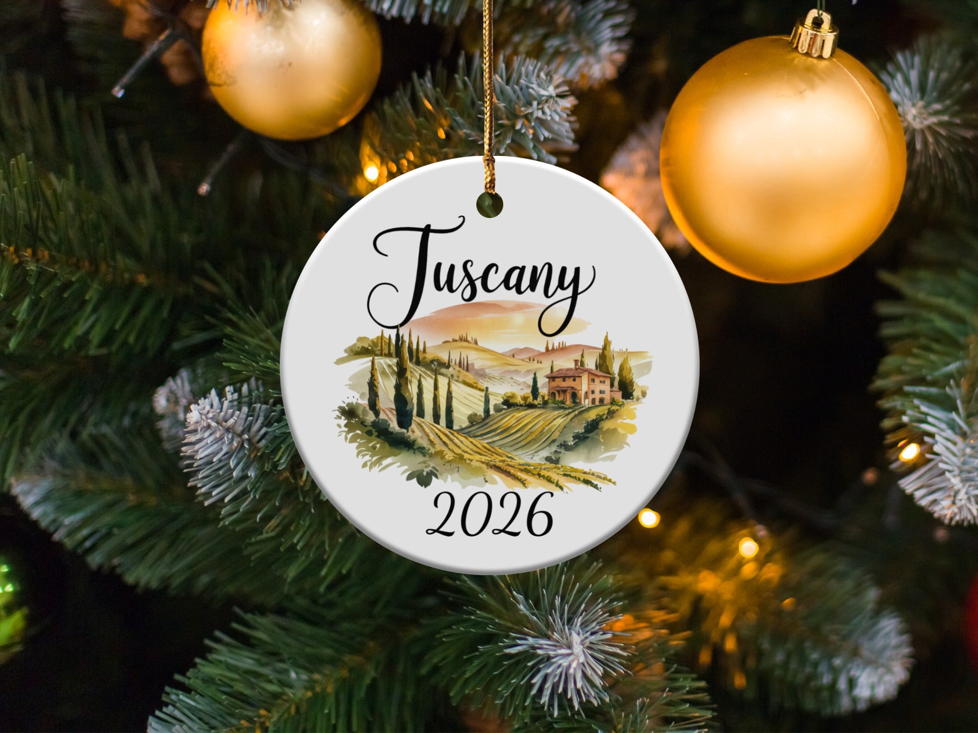 Round Christmas ornament with Tuscany landscape and 2026.