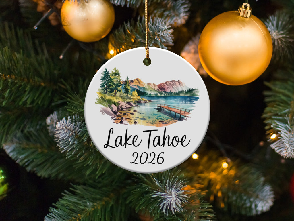 Round ornament with Lake Tahoe landscape and text.