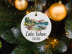 Round ornament with Lake Tahoe landscape and text.