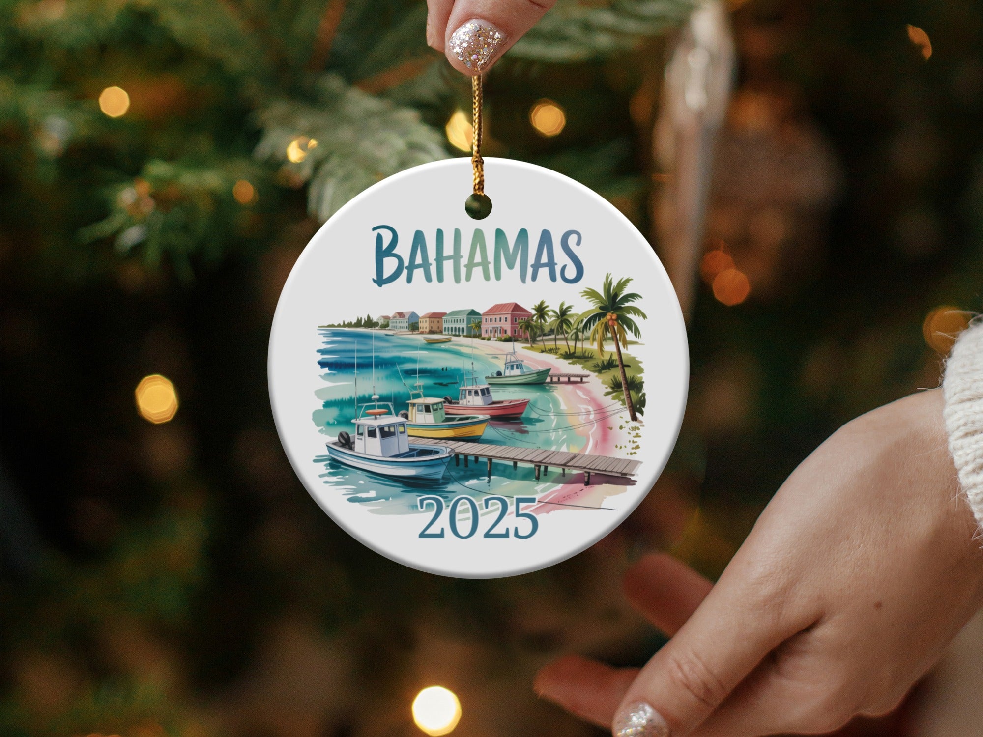 Bahamas 2025 ceramic ornament with boats on water and buildings.