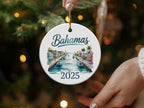 Bahamas 2025 ornament with colorful buildings and boats along a canal.