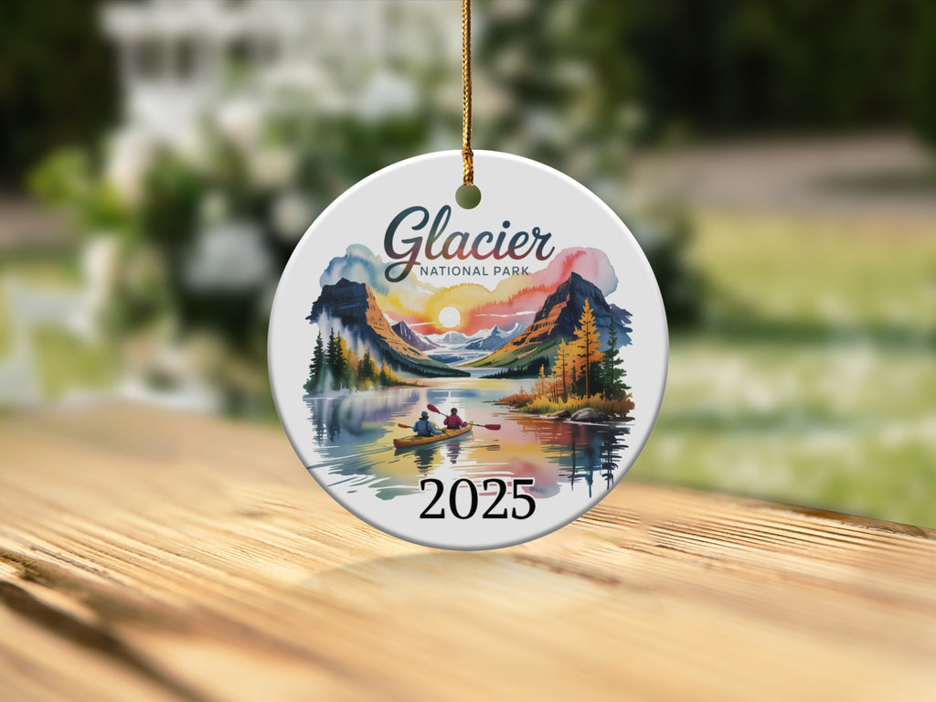 Glacier National Park 2025 round ornament with kayakers on a lake.