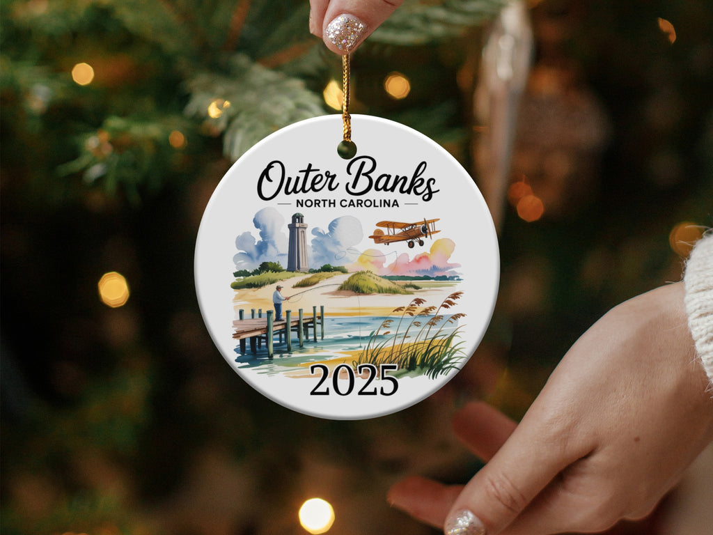 Outer Banks, North Carolina 2025 ceramic ornament with lighthouse and biplane.