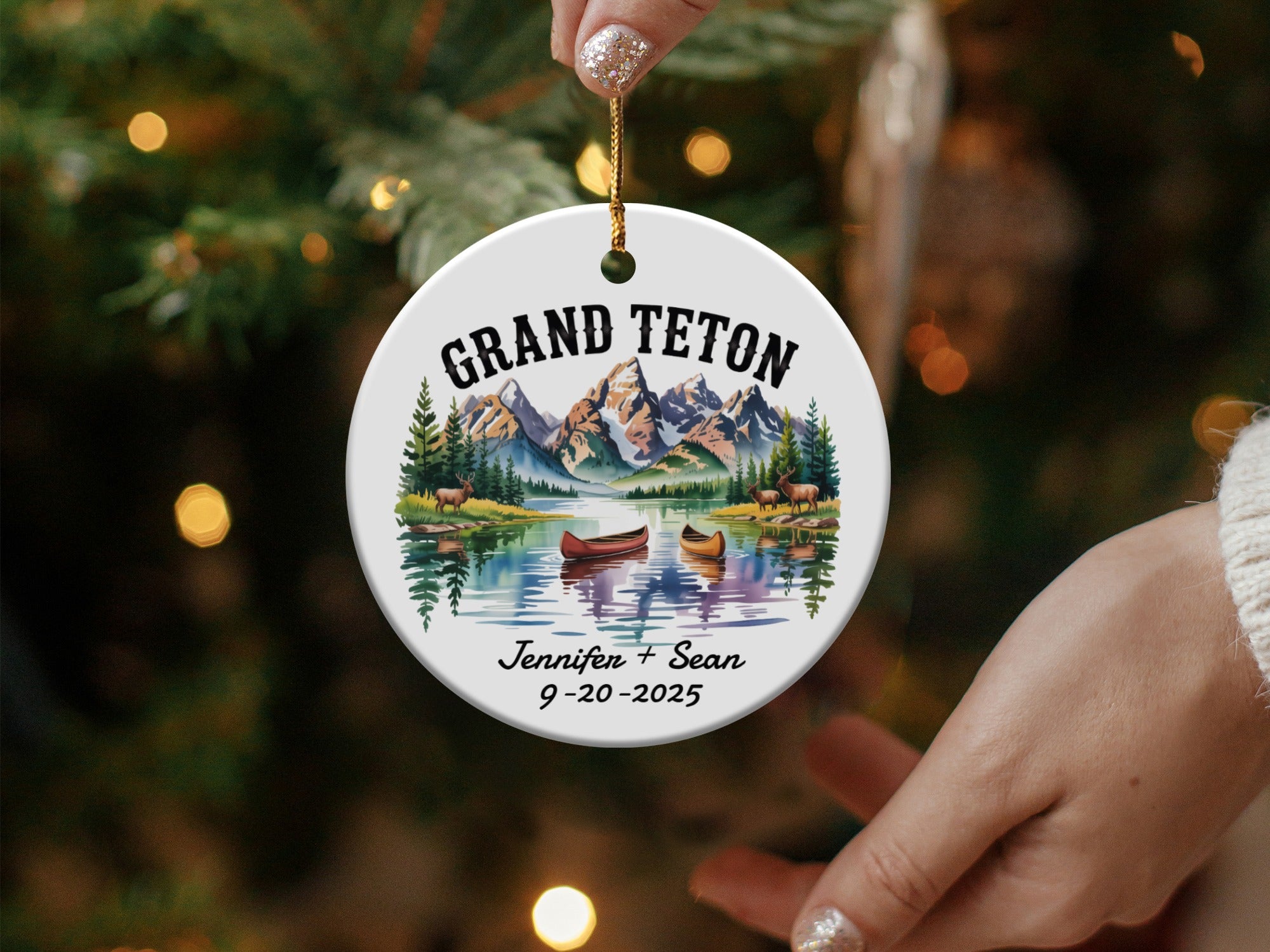 Grand Teton ornament with mountains, lake, canoes, and personalized text.