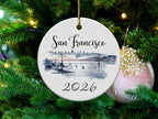 Round ceramic San Francisco ornament with skyline and "2026" below.