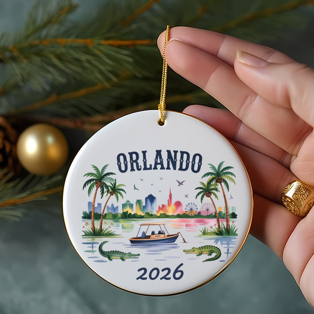 Orlando 2026 ornament with skyline, palm trees, and alligators.
