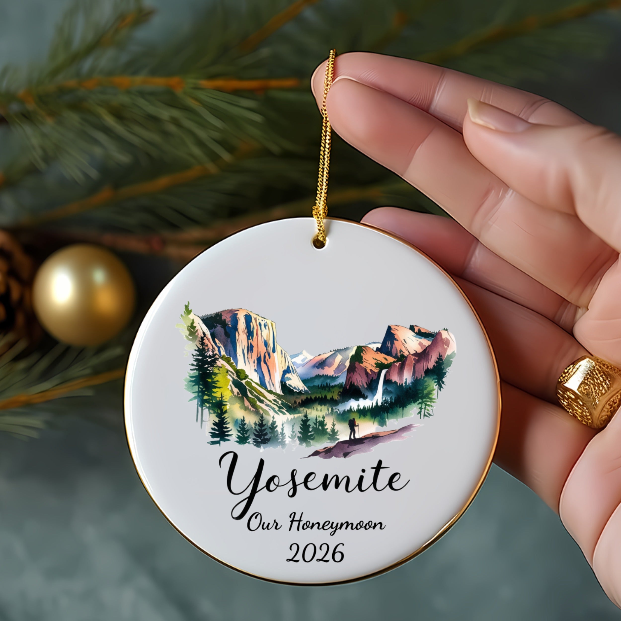 Yosemite honeymoon ornament with watercolor landscape and couple.