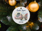White ornament with Osaka Castle, canal, and "Osaka, Japan 2026" text.