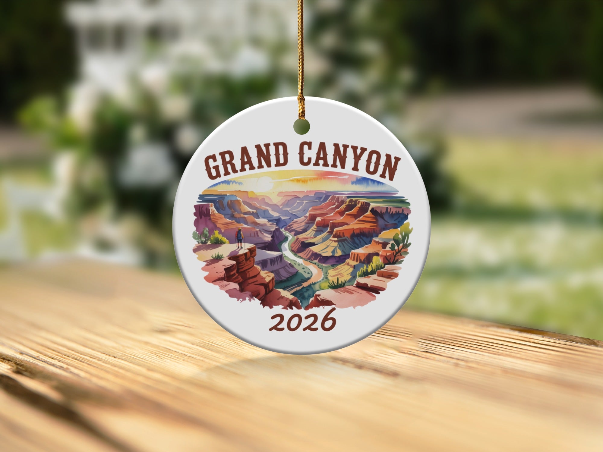 Grand Canyon 2026 ceramic ornament with colorful landscape illustration.