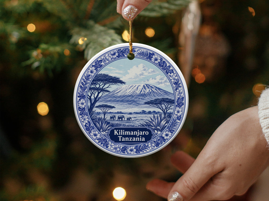 Round ornament depicting Kilimanjaro and elephants, with text "Kilimanjaro Tanzania".