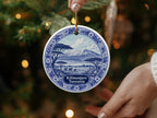 Round ornament depicting Kilimanjaro and elephants, with text "Kilimanjaro Tanzania".