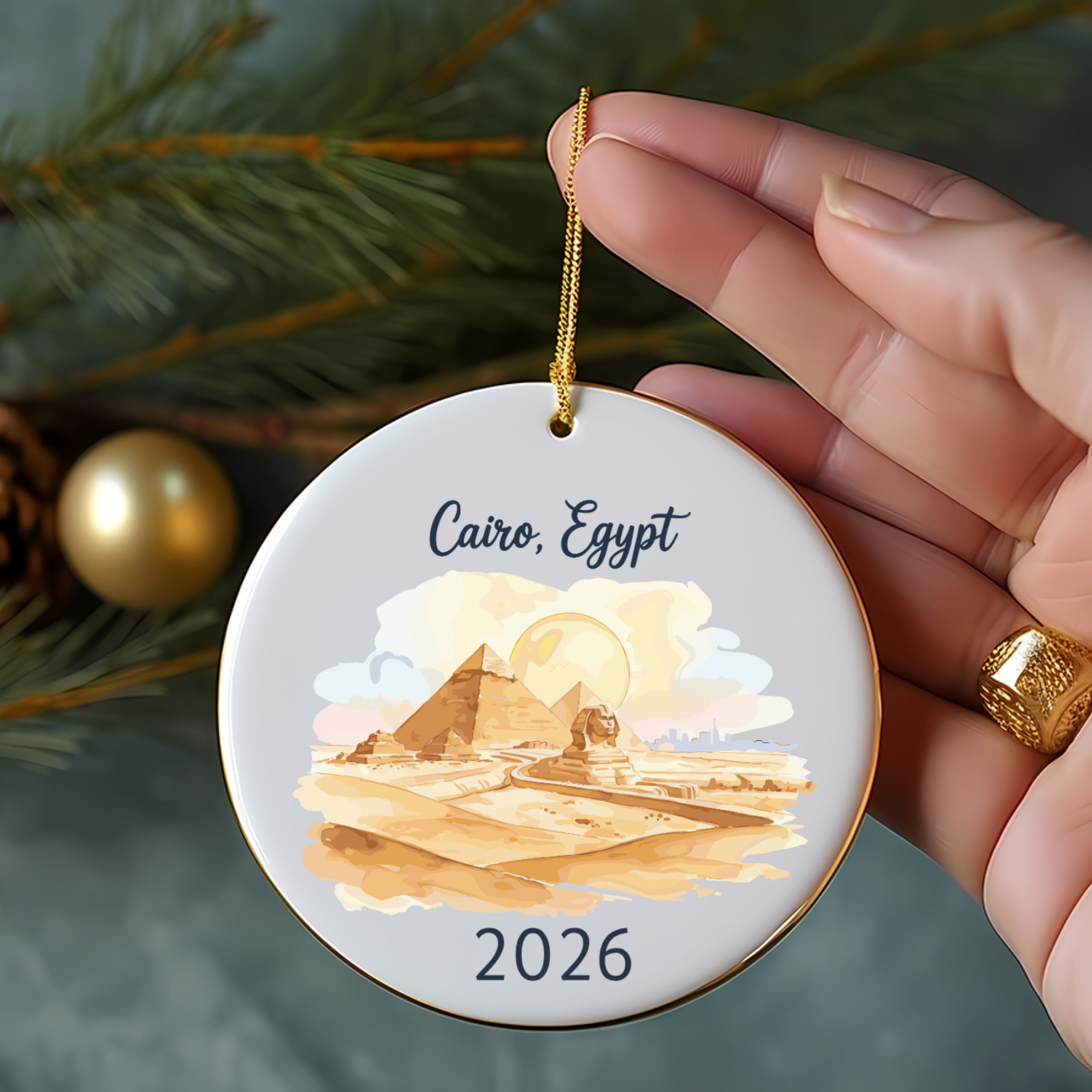 Ornament with Cairo, Egypt pyramids and Sphinx, and "2026".