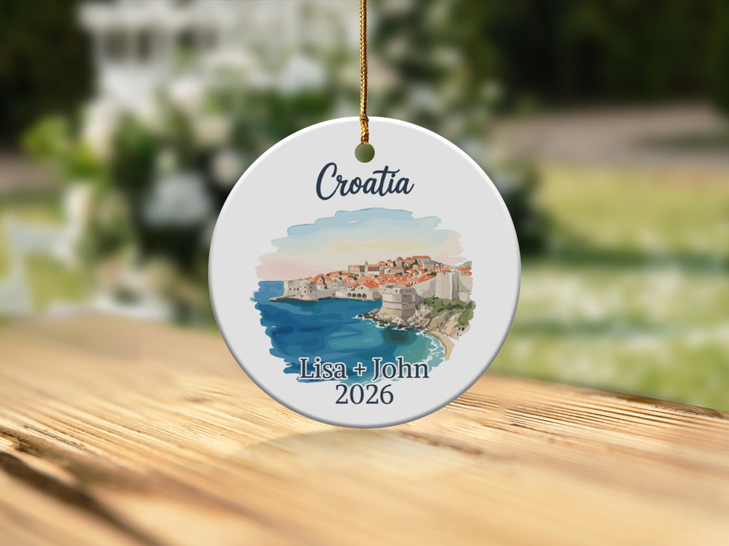 Croatia Christmas ornament with coastal town and names "Lisa + John 2026".