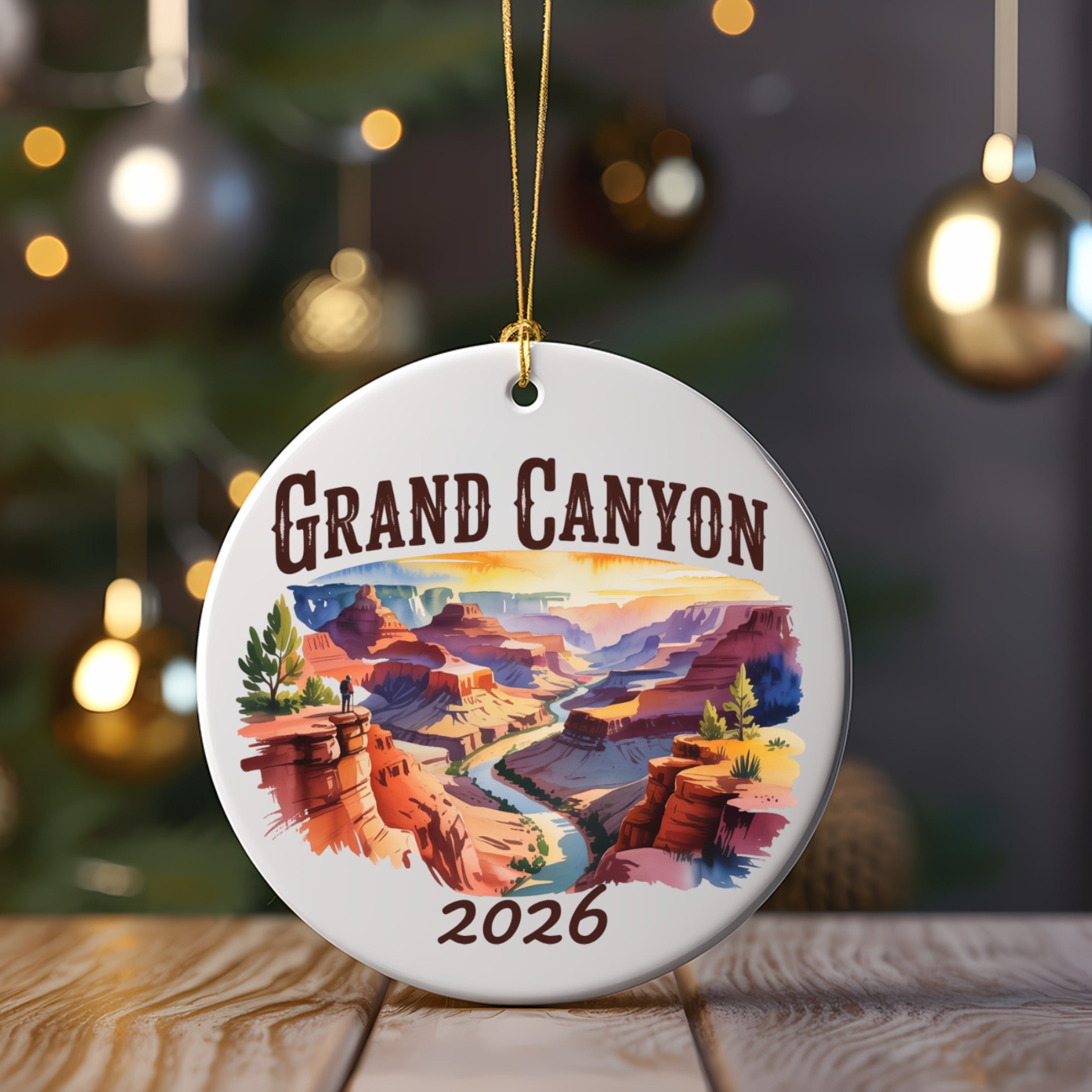 Grand Canyon 2026 round ceramic ornament with desert landscape.