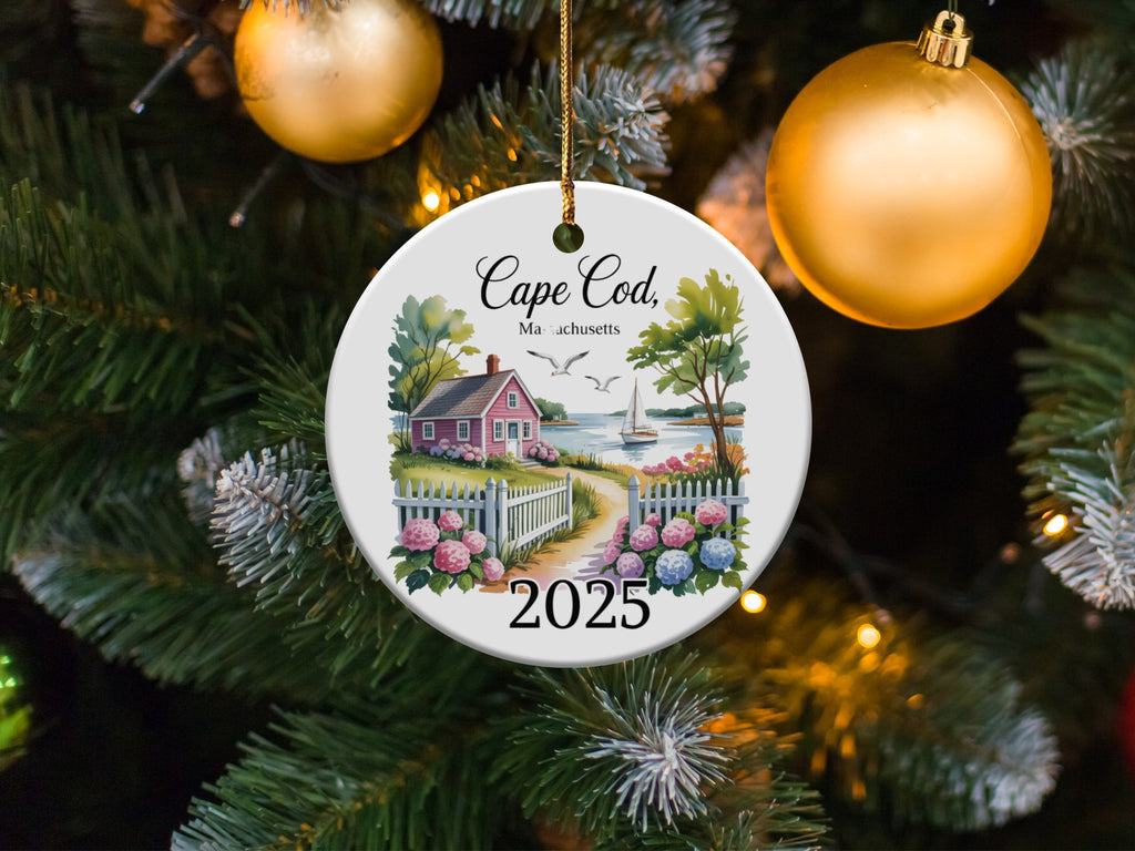 Cape Cod Massachusetts 2025 ceramic ornament with house, fence, and ocean view.