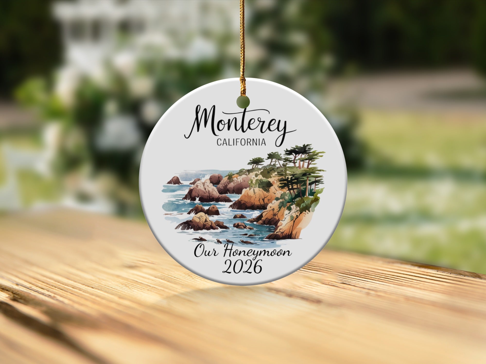 Round ornament with Monterey, California and Our Honeymoon 2026 text.