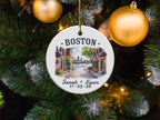 Boston landmark scene with dates "Sarah + Kevin 11-25-26" on ceramic ornament.