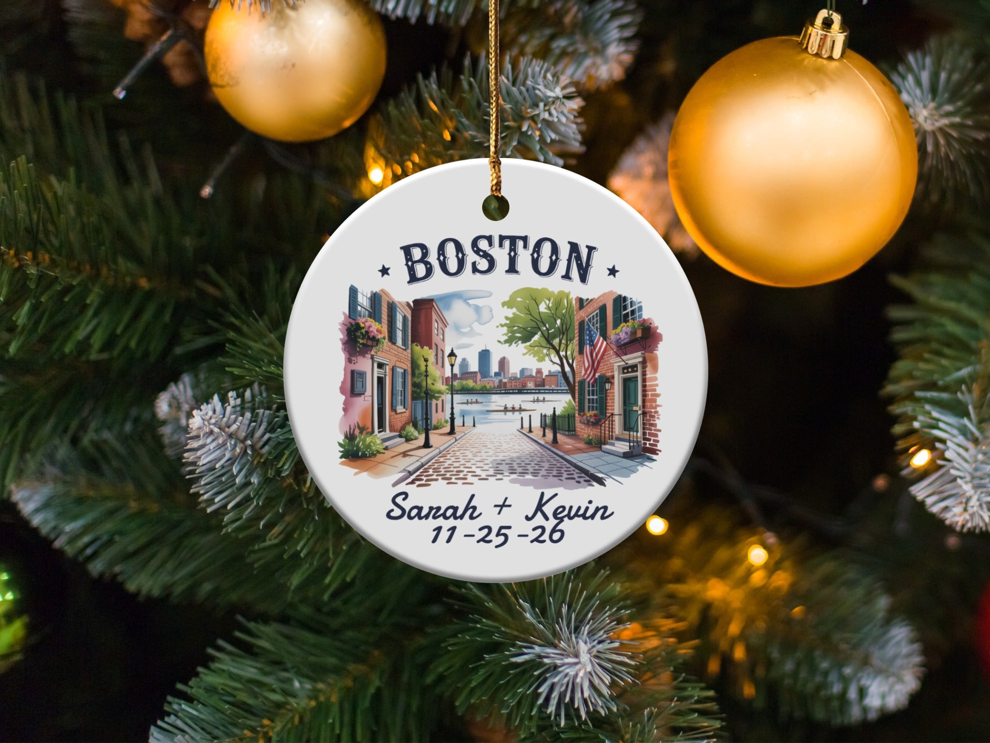 Boston landmark scene with dates "Sarah + Kevin 11-25-26" on ceramic ornament.