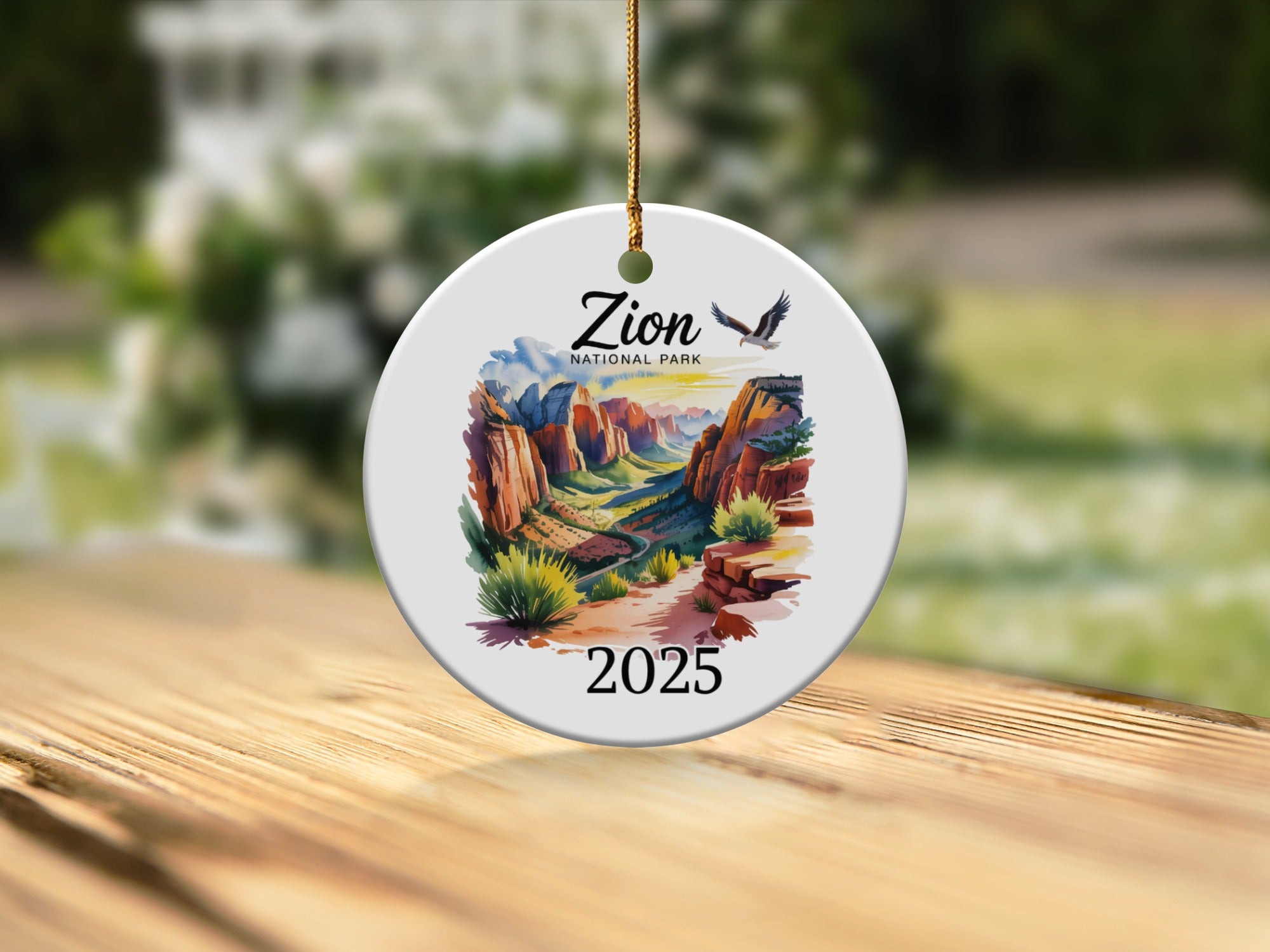 Zion National Park 2025 ceramic ornament featuring landscape and eagle.