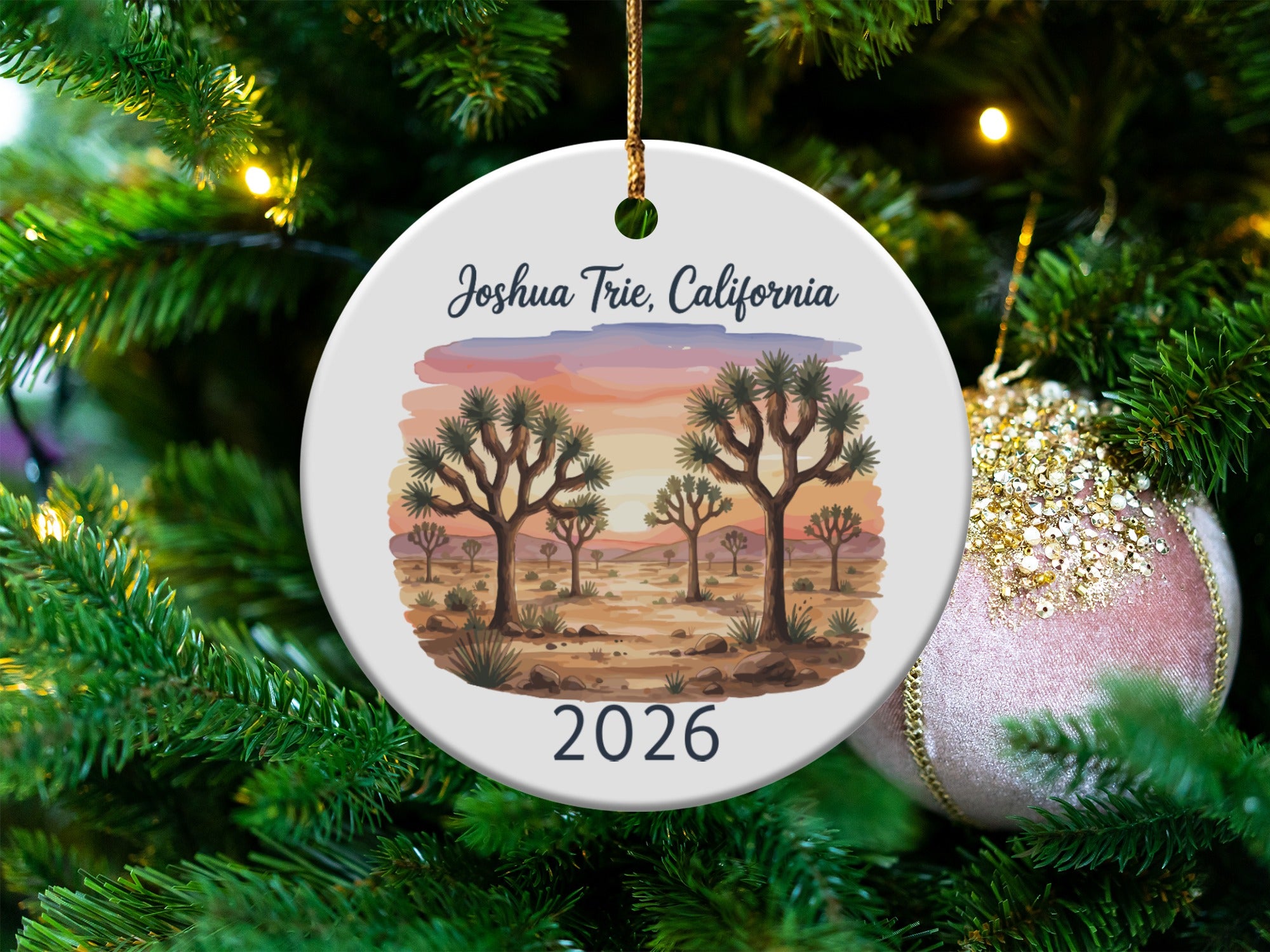 Round ornament with Joshua Tree landscape and "Joshua Tree, California 2026" text.
