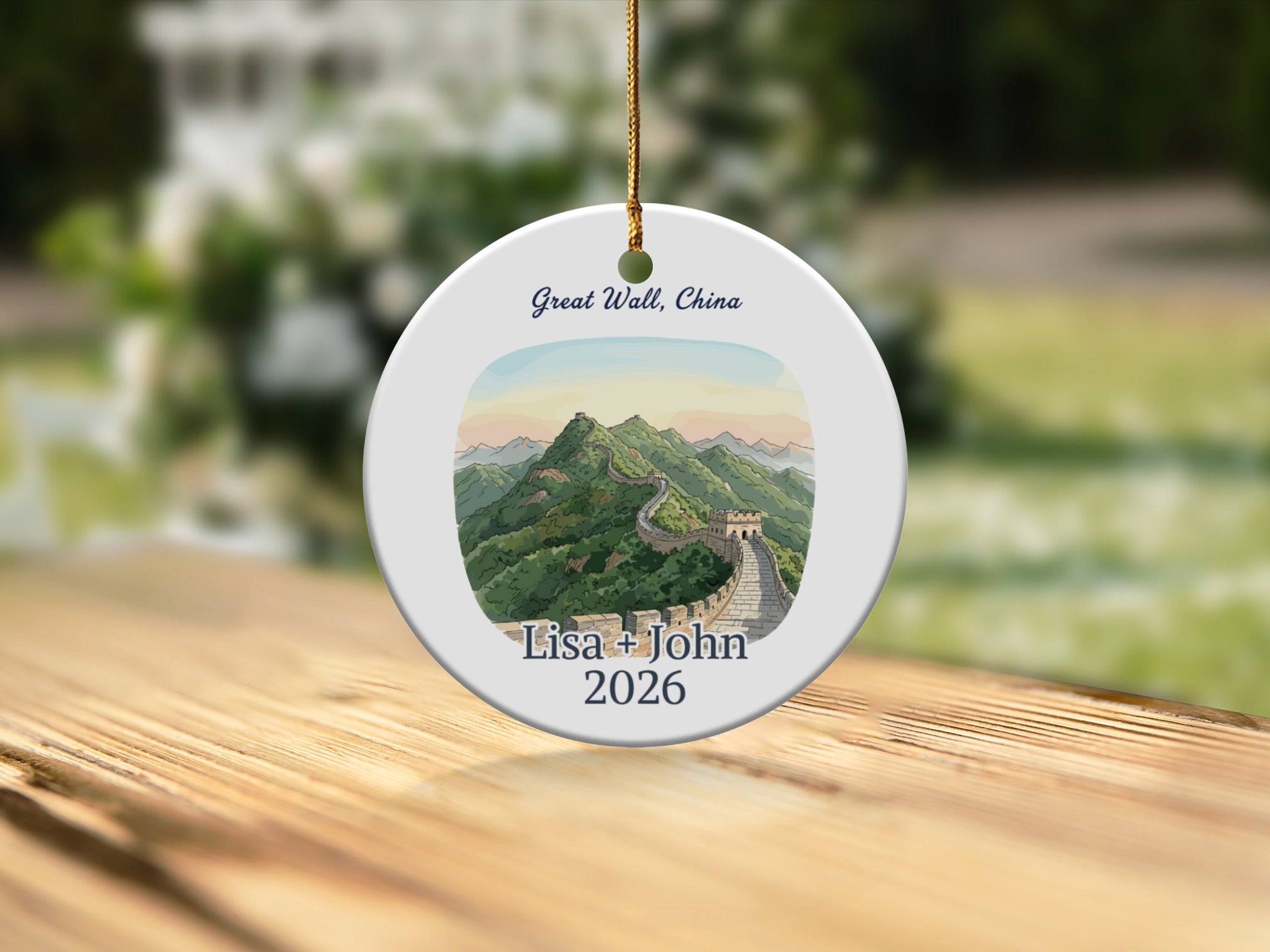 Ornament depicting the Great Wall of China with "Lisa + John 2026" in script.