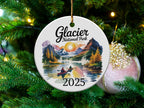 Glacier National Park ornament with a lake, mountains, and kayakers, dated 2025.