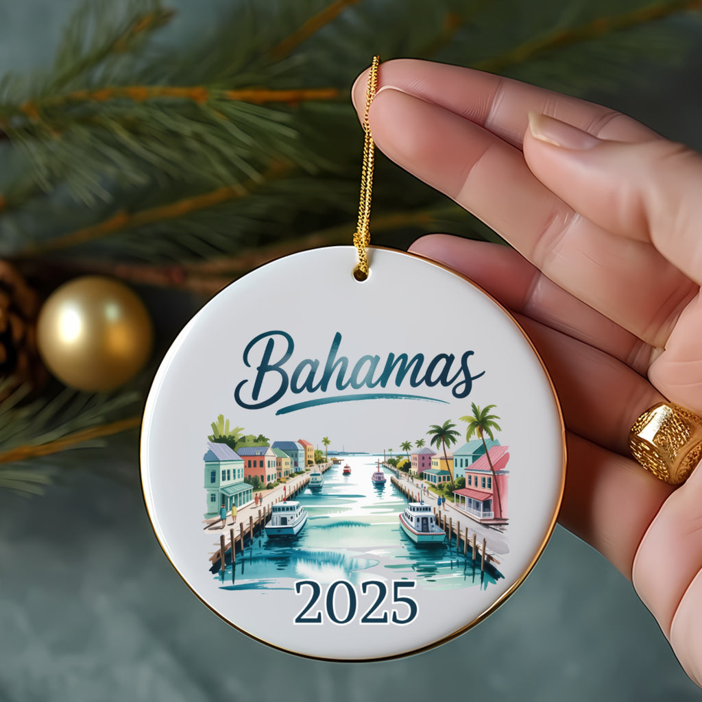 Round Bahamas 2025 ornament with colorful buildings and palm trees.