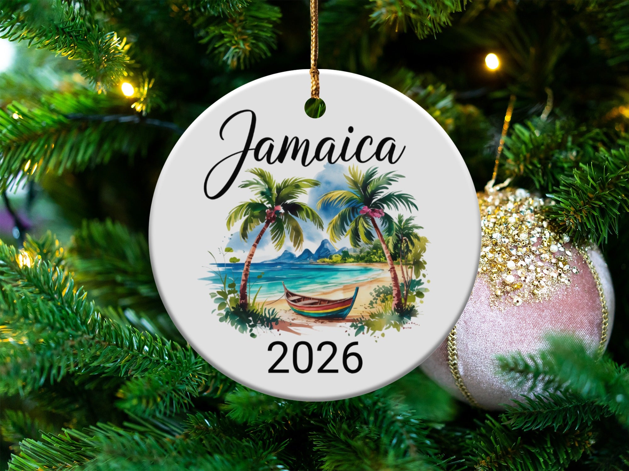 Round ceramic ornament with a tropical beach scene and "Jamaica 2026" text.