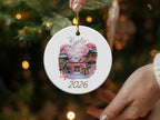 Round ceramic ornament with Kyoto temple, cherry blossoms, and 2026.