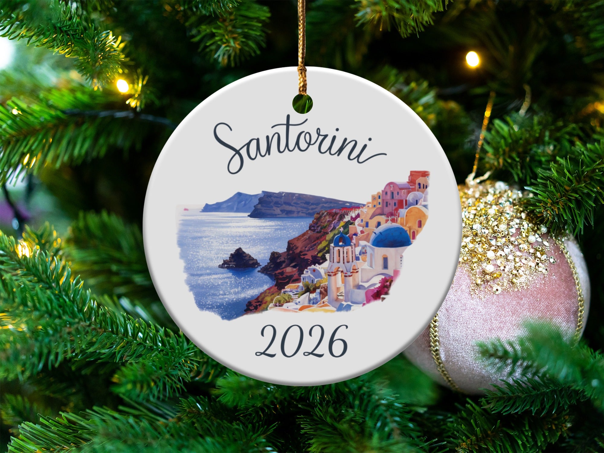 Santorini 2026 ceramic ornament with village on cliffs overlooking water.
