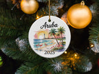 Aruba 2025 Christmas ornament with flamingos and palm trees.